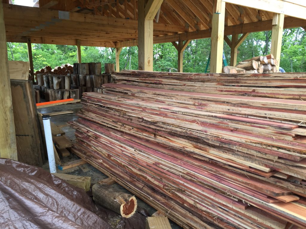 Rough cedar lumber can be easily used as lap siding on a home with minimal expense if you know where to find it!