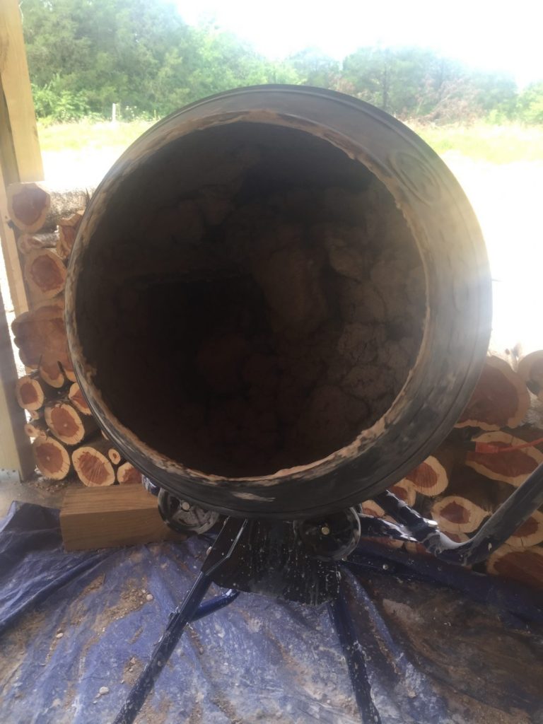 A concrete mixer isn't necessary to make the mortar for building with cordwood, but it sure was worth the money!