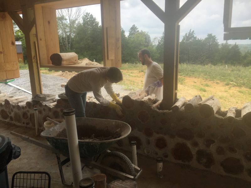 Building a cordwood wall - check out their progress updates!