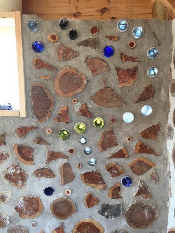You can use bottles in a cordwood wall to make constellations. Here is the constellation Orion.