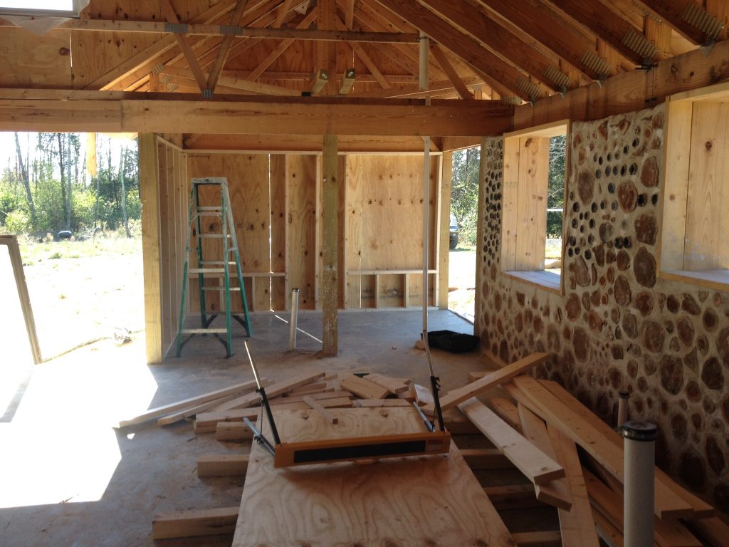 Stud framed wall with sheathing as seen from the inside 