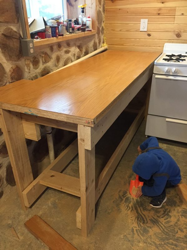 We repurposed this solid core door into a sturdy and affordable countertop. #upcycled #kitchendiy